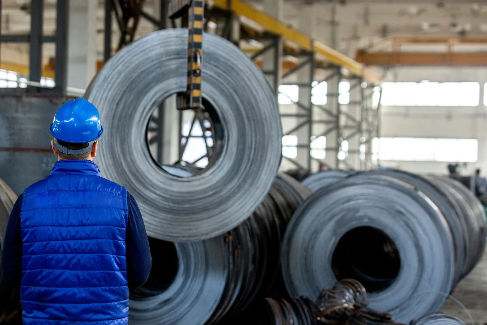 Steel coils inside a modern industrial facility
